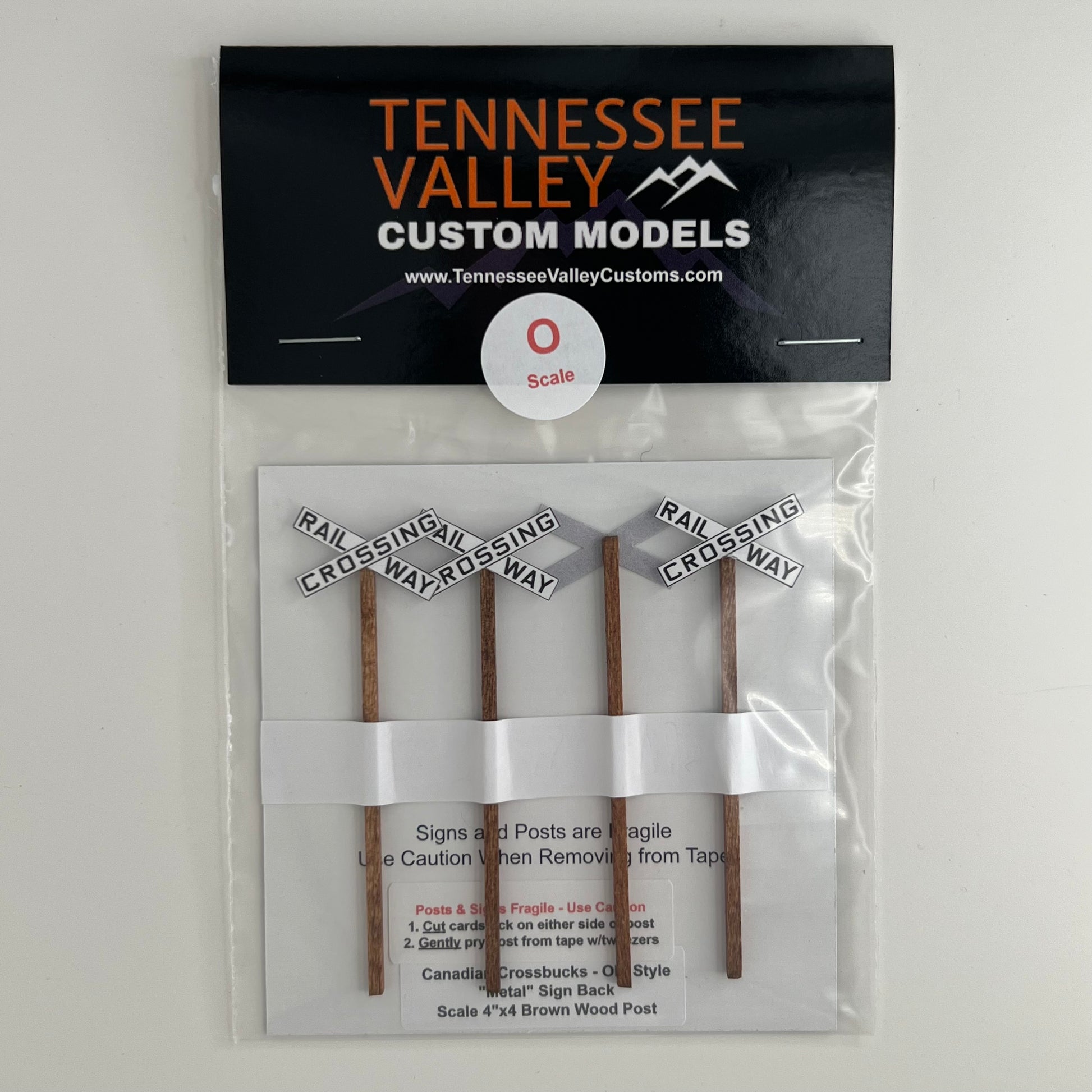 Model Railway Sign, Model  Train Sign,Model Railroad Sign, Canadian Cross bucks, Railway Crossing black letters, White background, x shape, four pack, Model Railroad Layout, Diorama, metal pole, white post, brown post, Scale, O Gauge, N Scale, N Gauge, HO Scale, HO Gauge, S Scale, S Gauge 